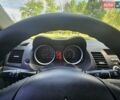 Серый Мицубиси Лансер, объемом двигателя 1.5 л и пробегом 187 тыс. км за 6642 $, фото 30 на Automoto.ua