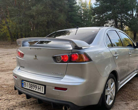 Серый Мицубиси Лансер, объемом двигателя 2 л и пробегом 239 тыс. км за 6999 $, фото 28 на Automoto.ua
