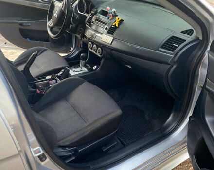 Серый Мицубиси Лансер, объемом двигателя 2 л и пробегом 239 тыс. км за 6999 $, фото 32 на Automoto.ua