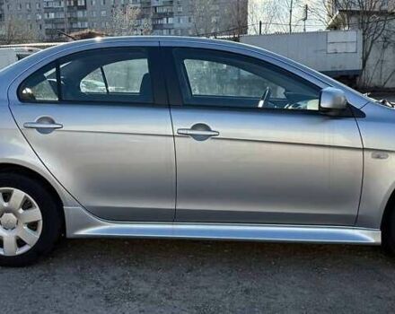 Серый Мицубиси Лансер, объемом двигателя 2 л и пробегом 272 тыс. км за 4499 $, фото 5 на Automoto.ua