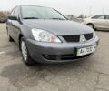 Сірий Міцубісі Lancer, об'ємом двигуна 1.6 л та пробігом 62 тис. км за 7300 $, фото 1 на Automoto.ua