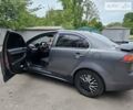 Сірий Міцубісі Lancer, об'ємом двигуна 1.5 л та пробігом 260 тис. км за 5900 $, фото 4 на Automoto.ua