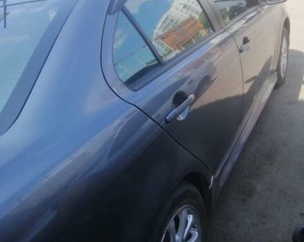 Сірий Міцубісі Lancer, об'ємом двигуна 2 л та пробігом 263 тис. км за 7000 $, фото 3 на Automoto.ua
