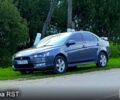 Серый Мицубиси Лансер, объемом двигателя 1.5 л и пробегом 240 тыс. км за 6000 $, фото 1 на Automoto.ua