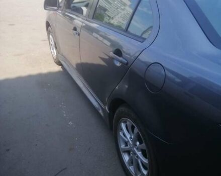 Сірий Міцубісі Lancer, об'ємом двигуна 2 л та пробігом 263 тис. км за 7000 $, фото 5 на Automoto.ua
