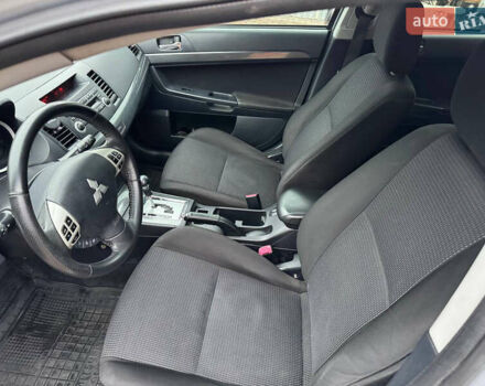 Сірий Міцубісі Lancer, об'ємом двигуна 2 л та пробігом 173 тис. км за 7200 $, фото 25 на Automoto.ua