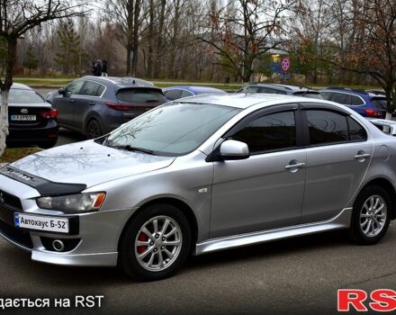 Серый Мицубиси Лансер, объемом двигателя 2 л и пробегом 178 тыс. км за 7400 $, фото 2 на Automoto.ua