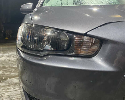 Серый Мицубиси Лансер, объемом двигателя 1.5 л и пробегом 227 тыс. км за 7300 $, фото 6 на Automoto.ua