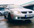 Сірий Міцубісі Lancer, об'ємом двигуна 1.6 л та пробігом 312 тис. км за 5250 $, фото 1 на Automoto.ua