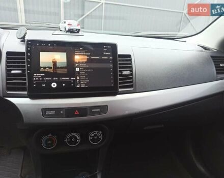 Сірий Міцубісі Lancer, об'ємом двигуна 1.5 л та пробігом 255 тис. км за 7500 $, фото 14 на Automoto.ua