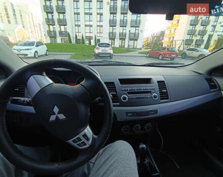 Серый Мицубиси Лансер, объемом двигателя 1.5 л и пробегом 244 тыс. км за 5500 $, фото 1 на Automoto.ua