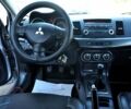 Сірий Міцубісі Lancer, об'ємом двигуна 2 л та пробігом 223 тис. км за 6900 $, фото 20 на Automoto.ua