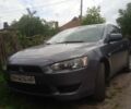 Сірий Міцубісі Lancer, об'ємом двигуна 0.15 л та пробігом 337 тис. км за 5600 $, фото 1 на Automoto.ua