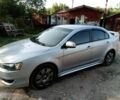 Сірий Міцубісі Lancer, об'ємом двигуна 0.15 л та пробігом 139 тис. км за 6500 $, фото 1 на Automoto.ua