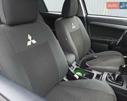 Сірий Міцубісі Lancer, об'ємом двигуна 1.5 л та пробігом 255 тис. км за 7500 $, фото 17 на Automoto.ua