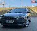 Сірий Міцубісі Lancer, об'ємом двигуна 1.5 л та пробігом 149 тис. км за 5800 $, фото 1 на Automoto.ua