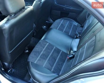 Сірий Міцубісі Lancer, об'ємом двигуна 2 л та пробігом 223 тис. км за 6900 $, фото 19 на Automoto.ua
