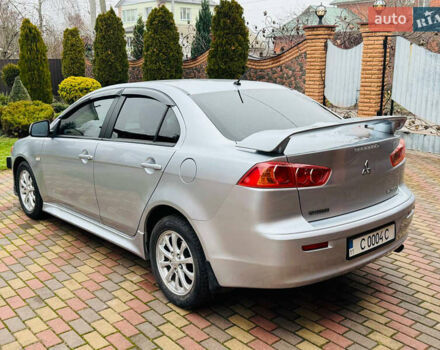 Сірий Міцубісі Lancer, об'ємом двигуна 2 л та пробігом 173 тис. км за 7200 $, фото 13 на Automoto.ua