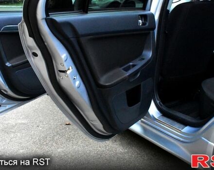 Серый Мицубиси Лансер, объемом двигателя 2 л и пробегом 178 тыс. км за 7400 $, фото 9 на Automoto.ua