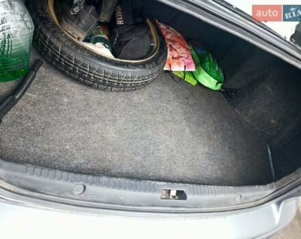 Сірий Міцубісі Lancer, об'ємом двигуна 2 л та пробігом 263 тис. км за 7000 $, фото 4 на Automoto.ua