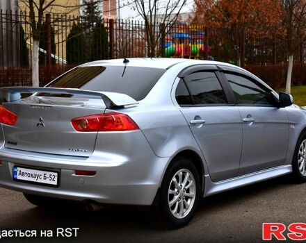 Серый Мицубиси Лансер, объемом двигателя 2 л и пробегом 178 тыс. км за 7400 $, фото 4 на Automoto.ua