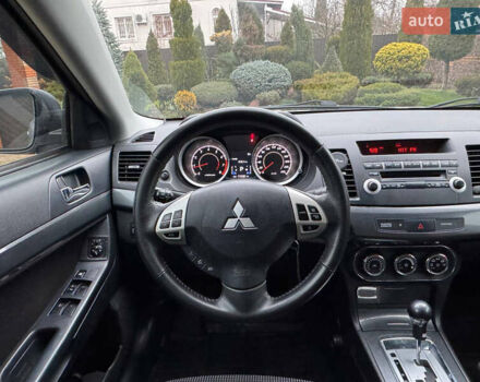 Сірий Міцубісі Lancer, об'ємом двигуна 2 л та пробігом 173 тис. км за 7200 $, фото 28 на Automoto.ua