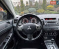 Сірий Міцубісі Lancer, об'ємом двигуна 2 л та пробігом 173 тис. км за 7200 $, фото 28 на Automoto.ua