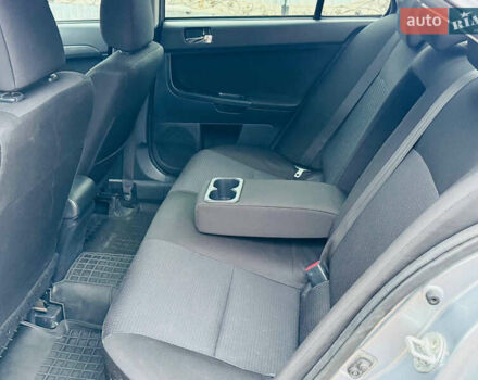 Сірий Міцубісі Lancer, об'ємом двигуна 2 л та пробігом 173 тис. км за 7200 $, фото 31 на Automoto.ua