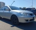 Серый Мицубиси Лансер, объемом двигателя 1.6 л и пробегом 320 тыс. км за 5076 $, фото 1 на Automoto.ua