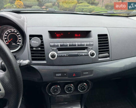 Сірий Міцубісі Lancer, об'ємом двигуна 2 л та пробігом 173 тис. км за 7200 $, фото 23 на Automoto.ua