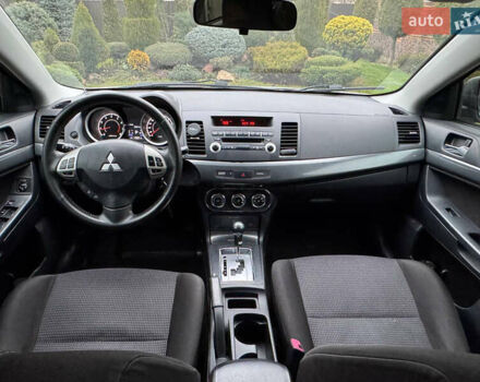 Сірий Міцубісі Lancer, об'ємом двигуна 2 л та пробігом 173 тис. км за 7200 $, фото 29 на Automoto.ua