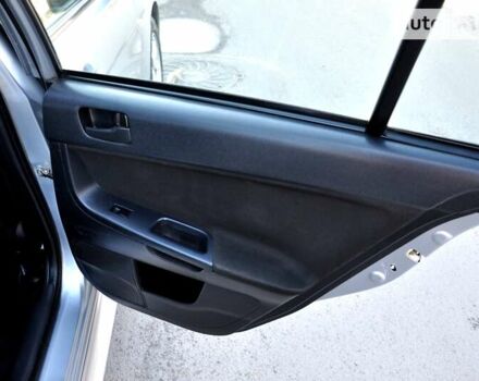 Сірий Міцубісі Lancer, об'ємом двигуна 2 л та пробігом 223 тис. км за 6900 $, фото 25 на Automoto.ua