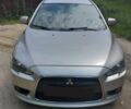 Сірий Міцубісі Lancer, об'ємом двигуна 1.8 л та пробігом 223 тис. км за 7000 $, фото 1 на Automoto.ua