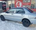 Серый Мицубиси Лансер, объемом двигателя 1.6 л и пробегом 312 тыс. км за 5500 $, фото 1 на Automoto.ua