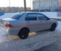 Сірий Міцубісі Lancer, об'ємом двигуна 1.6 л та пробігом 312 тис. км за 5500 $, фото 1 на Automoto.ua