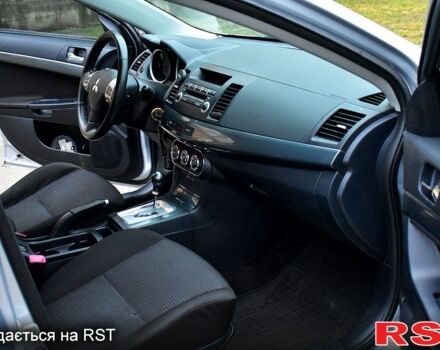 Серый Мицубиси Лансер, объемом двигателя 2 л и пробегом 178 тыс. км за 7400 $, фото 11 на Automoto.ua