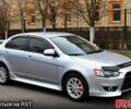 Сірий Міцубісі Lancer, об'ємом двигуна 2 л та пробігом 178 тис. км за 7400 $, фото 1 на Automoto.ua