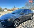 Сірий Міцубісі Lancer, об'ємом двигуна 1.59 л та пробігом 250 тис. км за 7300 $, фото 1 на Automoto.ua