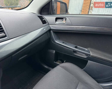 Сірий Міцубісі Lancer, об'ємом двигуна 2 л та пробігом 173 тис. км за 7200 $, фото 30 на Automoto.ua