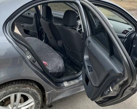 Сірий Міцубісі Lancer, об'ємом двигуна 2 л та пробігом 217 тис. км за 8500 $, фото 12 на Automoto.ua