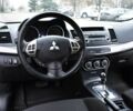 Сірий Міцубісі Lancer, об'ємом двигуна 2 л та пробігом 178 тис. км за 7400 $, фото 19 на Automoto.ua