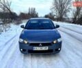 Серый Мицубиси Лансер, объемом двигателя 2 л и пробегом 225 тыс. км за 8500 $, фото 1 на Automoto.ua