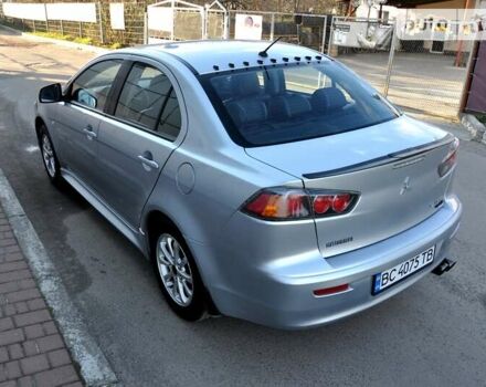 Сірий Міцубісі Lancer, об'ємом двигуна 2 л та пробігом 223 тис. км за 6900 $, фото 12 на Automoto.ua