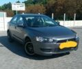 Сірий Міцубісі Lancer, об'ємом двигуна 1.5 л та пробігом 213 тис. км за 7300 $, фото 1 на Automoto.ua