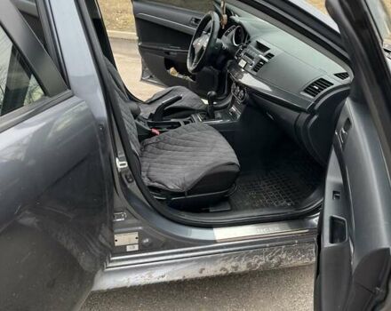Сірий Міцубісі Lancer, об'ємом двигуна 2 л та пробігом 217 тис. км за 8500 $, фото 13 на Automoto.ua