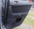 Сірий Міцубісі Lancer, об'ємом двигуна 1.5 л та пробігом 255 тис. км за 7500 $, фото 24 на Automoto.ua