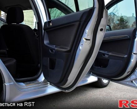 Серый Мицубиси Лансер, объемом двигателя 2 л и пробегом 178 тыс. км за 7400 $, фото 10 на Automoto.ua