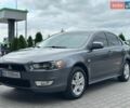 Сірий Міцубісі Lancer, об'ємом двигуна 1.5 л та пробігом 240 тис. км за 5500 $, фото 1 на Automoto.ua