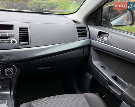 Сірий Міцубісі Lancer, об'ємом двигуна 2 л та пробігом 173 тис. км за 7200 $, фото 19 на Automoto.ua