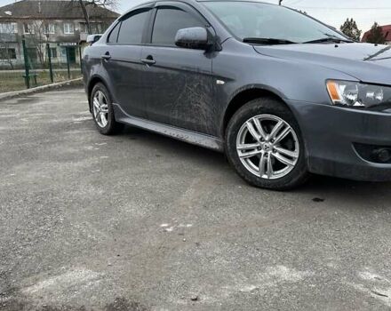 Сірий Міцубісі Lancer, об'ємом двигуна 2 л та пробігом 217 тис. км за 8500 $, фото 3 на Automoto.ua